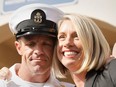 U.S. Navy SEAL Special Operations Chief Edward Gallagher, with wife Andrea Gallagher, celebrate after he was acquitted of most of the serious charges against him during his court-martial trial at Naval Base San Diego in San Diego, California , U.S.,  July 2, 2019.
