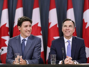 Prime Minister Justin Trudeau and Finance Minister Bill Morneau conduct a news conference about the government's decision on the Trans Mountain Expansion Project, in Ottawa on June 18, 2019.