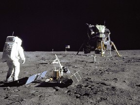 In this image obtained from NASA, Lunar Module pilot Buzz Aldrin was photographed during the Apollo 11 extravehicular activity on the moon by mission commander Neil Armstrong on July 20, 1969.