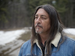 Kanesatake Mohawk Grand Chief Serge Simon poses for a portrait at the "pines," the site where the Oka Crisis began in 1990 in Oka, Quebec on Thursday, April 9, 2015.