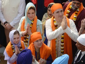 Canadian Prime Minister Justin Trudeau along with his wife Sophie Gregoire and their pay their respects at the Sikh Shrine Golden temple in Amritsar on February 21, 2018.
