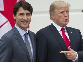 US.. President Donald Trump (R) welcomes Canadian Prime Minister Justin Trudeau at the White House in Washington, DC on Oct. 11, 2017.