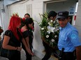 Family and friends arrive at the wake of Oscar Alberto Martinez Ramirez and his daughter Valeria, migrants who drowned in the Rio Grande river during their journey to the U.S., at La Bermeja cemetery in San Salvador, El Salvador, June 30, 2019.