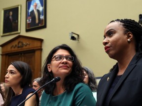 U.S. Rep. Alexandria Ocasio-Cortez (D-NY) Rep. Rashida Tlaib (D-MI) and Rep. Ayanna S. Pressley (D-MA) attend a House Oversight and Reform Committee holds a hearing on "The Trump Administration's Child Separation Policy: Substantiated Allegations of Mistreatment." July 12, 2019 in Washington, DC.