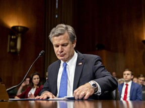 Christopher Wray, director of the FBI, arrives to a Senate Judiciary Committee hearing in Washington, D.C., U.S., on Tuesday, July 23, 2019. Wray said during the hearing that China is the biggest counterintelligence threat to the U.S.