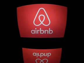 This file photo taken on March 02, 2017 shows the logo of online lodging service Airbnb displayed on a computer screen in Paris.