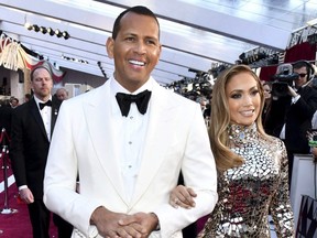 In this Sunday, Feb. 24, 2019, file photo, Alex Rodriguez, left, and Jennifer Lopez arrive at the Oscars at the Dolby Theatre in Los Angeles.