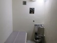A solitary confinement cell.
