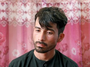 Mirwais Elmi 26, an Afghan groom who survived a suicide attack at his wedding reception on Saturday night, pauses during an interview at his house in Kabul, Afghanistan August 19, 2019.REUTERS/Mohammad Ismail ORG XMIT: GGGKAB203