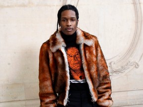 In this file photo taken on January 23, 2017, U.S. rapper ASAP Rocky poses before the Christian Dior 2017 spring/summer Haute Couture collection fashion show in Paris.