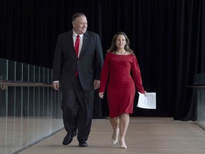 Canadian Foreign Affairs Minister Chrystia Freeland and US Secretary of State Mike Pompeo walk to a joint news conference in Ottawa, Thursday, Aug. 22, 2019.