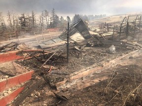 Fire damage to the Rocking Heart Ranch just outside Waterton Lakes National Park is shown in a handout photo.