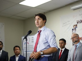 Prime Minister Justin Trudeau speaks during a press conference at the Parkdale Intercultural Association in Toronto, Monday, Aug. 12, 2019 to announce funding for legal aid in Ontario.