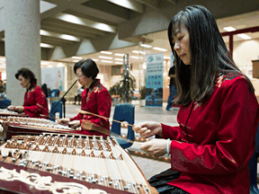 Musicians with the Confucius Institute play dulcimers during Global Confucius Institute Day at the Centre for Education in Edmonton on Sept. 27, 2014. The Edmonton school board recently renewed its Confucius contract for another five years.