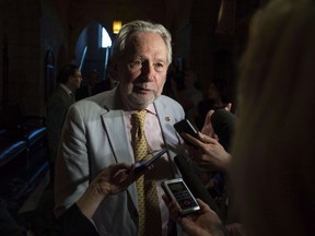 The Liberal government's representative in the Senate is urging all parties vying for power in the Oct. 21 election to promise to change the law so that future prime ministers would also use an independent, arm's-length appointment process to name new senators. Sen. Peter Harder, Government Representative in the Senate, speaks to reporters on Parliament Hill in Ottawa on Tuesday, June 19, 2018.