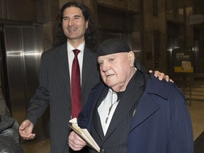 James Sears and LeRoy St. Germaine (right) leave court after being found guilty of promoting hate in Toronto on Thursday, January 24, 2019. The publisher of a free Toronto newspaper that promoted hatred against Jews and women has been sentenced to 12 months of house arrest.The judge says St. Germaine poses no danger to the community.
