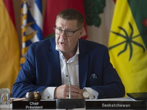Saskatchewan Premier Scott Moe speaks during a meeting of Canada's premiers in Saskatoon, Sask. Wednesday, July 10, 2019. Moe has announced a small cabinet shuffle, saying three members of his cabinet are switching roles.