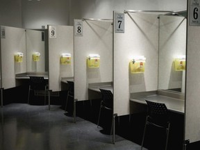 Injection booths are seen at Insite in Vancouver, British Columbia, on May 6, 2008. The Alberta goverment is forming a panel to examine the social and economic impacts of safe injection sites for IV drug users. The eight-member group will not consider testimony on the health benefits of such sites or on the social issues surrounding drug abuse.