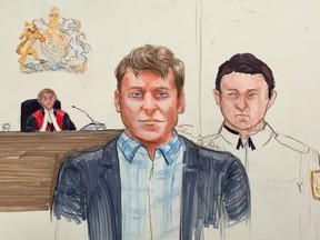 Andrew Berry, centre, appears in B.C. Supreme Court in Vancouver on Tuesday, April 16, 2019. A Vancouver Island father who is accused of killing his two daughters painted a picture of a happy life with them.Andrew Berry told the jury Wednesday that he did not kill his daughters nor did he try to commit suicide.