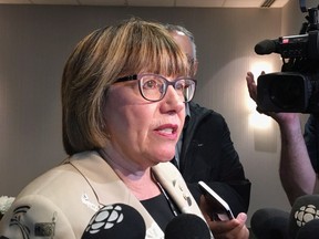Former federal finance minister Anne McLellan speaks to reporters at the World Cannabis Congress in Saint John, N.B., on Monday, June 11, 2018. The former Liberal minister charged with making recommendations on whether the roles of justice minister and attorney general should be separated is recommending no structural changes should be made.THE CANADIAN PRESS/Kevin Bissett
