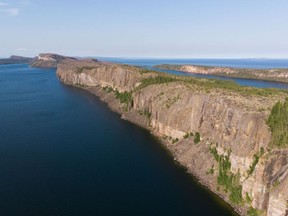 Cliffs of the Pethei Peninsula overlooking Tu Nedhe (Great Slave Lake) in Thaidene Nene is seen in this undated photo provided August 20, 2019. Canada and northern First Nations are signing a deal today that will create a vast new national park reserve that is expected to be a model for future conservation efforts.Thaidene Nene (tie-DEH-nay neh-NAY) covers nearly 27,000 square kilometres of pristine waters and forests along the east arm of Great Slave Lake in the Northwest Territories. THE CANADIAN PRESS/HO, Pat Kane *MANDATORY CREDIT*