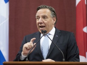 Quebec Premier Francois Legault speaks during an Ordre national du Quebec ceremony at the National Assembly, in Quebec City on Thursday, June 20, 2019. New statistics show Quebec is making good on its promise to reduce its share of immigrants in 2019, but the province has cut deeply in the category of skilled workers, which runs contrary to the government's stated goals.