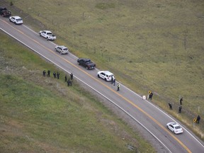 Closing arguments are scheduled today in the trial of a youth accused of shooting a German tourist in the head on a highway west of Calgary last summer. Police investigate the scene of a shooting along Highway 1A near Morley, Alta., in this August 2018 police handout photo.