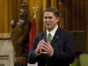Speaker of the House of Commons Andrew Scheer thanks his wife and parents after taking his place after the final round of voting in the House of Commons on Parliament Hill in Ottawa, Thursday June 2, 2011. The federal Liberals hinted Thursday at some of the notes they will look to strike in the fall campaign to win over young and progressive-minded voters when they circulated a video of Conservative Leader Andrew Scheer speaking out against same-sex marriage early in his career as an MP.