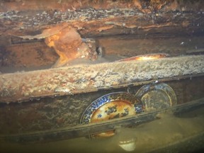 Flatware on racks are seen in the interior of the HMS Terror shipwreck, in an undated handout still image taken from video footage, in Terror Bay, Nunavut.