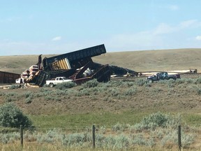 A train derailment is shown near the hamlet of Irvine, Alberta on Friday Aug. 2, 2019. Residents near a community in southeastern Alberta are being told to evacuate the area as a precaution following a train derailment. The Alberta government issued the emergency alert for people living within 6.5 kilometres of the hamlet of Irvine.