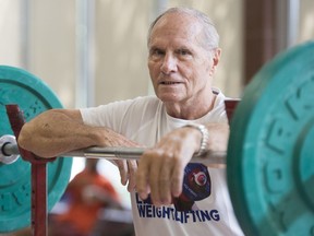 Marcel Perron poses in the training room during the 2019 World Masters Weightlifting Championship in Montreal, Saturday, Aug. 17, 2019. Perron competed on Friday and won in the 73-kilogram, 80-and-above class.