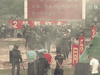 This screengrab taken from an undated video from China’s People’s Liberation Army Hong Kong Garrison shows “protesters” being detained by PLA soldiers during an “anti-riot” drill in Hong Kong.