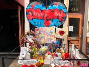A makeshift memorial sits outside Ned Peppers Bar in Dayton, Ohio where nine people were gunned down.