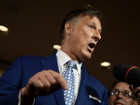 People's Party of Canada leader Maxime Bernier speaks to reporters at the PPC National Conference in Gatineau, Que. on Sunday, Aug. 18, 2019.