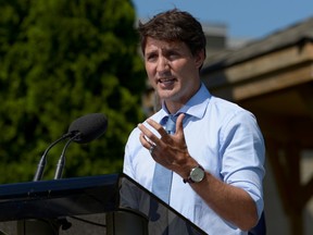 Canada's Prime Minister Justin Trudeau speaks about a watchdog's report that he breached ethics rules by trying to influence a corporate legal case, at the Niagara-on-the Lake Community Centre in Niagara-on-the-Lake, Ontario, Canada, August 14, 2019.