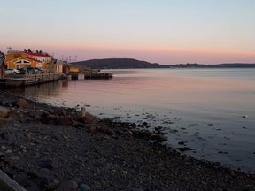 The sun sets on Didlo, Newfoundland on May 25, 2019.