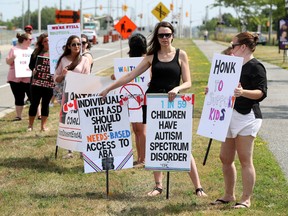 Parents, families and stakeholders took part in a autism rally held in front of MPP Lisa MacLeod's office in Ottawa on Aug 6, 2019.