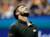 Damir Dzumhur of Bosnia and Herzegovina reacts during his second round match against Roger Federer of Switzerland on day three of the 2019 U.S. Open, Aug. 28, 2019.