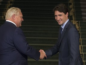 Ontario Premier Doug Ford and Prime Minister Justin Trudeau at Queens Park in Toronto, Ont. on  July 5, 2018. Happier times.