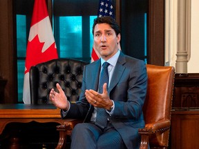 Prime Minister Justin Trudeau speaks to the media during a meeting with U.S. Secretary of State Mike Pompeo on Aug. 22, 2019, in Ottawa.