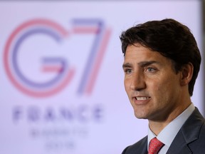 Canada's Prime Minister Justin Trudeau addresses media representatives at a press conference in Biarritz, south-west France on August 26, 2019, on the third day of the annual G7 Summit.