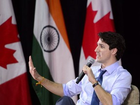 Prime Minister Justin Trudeau takes part in an armchair discussion at the Indian Institute of Management in Ahmedabad, India on Monday, Feb. 19, 2018.