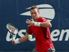 Vasek Pospisil of Canada returns a shot against Karen Khachanov of Russia during their first round match on day two of the 2019 US Open, August 27, 2019.