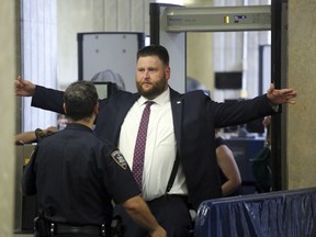 John Kinsman arrives for his trial at the State Supreme Court Building in Manhattan, Aug. 14, 2019. During the trial of Kinsman and another member of the Proud Boys, Maxwell Hare, who are both charged with attempted assault and riot, Manhattan prosecutors have suggested some of the blame for the violence should land on Gavin McInnes.