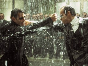 Keanu Reeves and Hugo Weaving in Warner Bros. Pictures' and Village Roadshow Pictures' futuristic action thriller "The Matrix Revolutions."