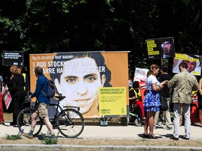 Activists demonstrate outside the Saudi Arabian Embassy against the recent Saudi court ruling that upheld a previous verdict of ten years in prison and 1,000 lashes for Saudi blogger Raif Badawi on June 11, 2015 in Berlin, Germany.