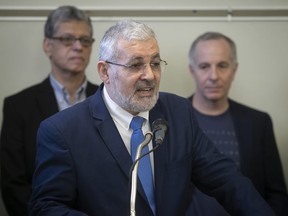 Hassan Guillet speaks to media during a press conference in Montreal on Wednesday January 23, 2019.