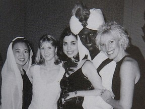 Canada’s Prime Minister Justin Trudeau, with his face and hands painted brown, poses with others during an "Arabian Nights" party when he was a 29-year-old teacher at the West Point Grey Academy in Vancouver, Canada, in this photo published in the academy’s 2000-2001 yearbook. This image, published in The View yearbook, was obtained by Time.