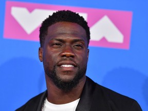 Comedian Kevin Hart and two other occupants survived a car crash just after midnight on Sunday morning that crushed the roof of his 1970 Plymouth Barracuda.