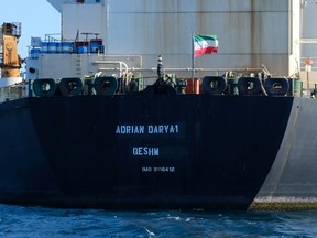 In this file photo taken on August 18, 2019 an Iranian flag flutters on board the Adrian Darya oil tanker, formerly known as Grace 1, off the coast of Gibraltar.